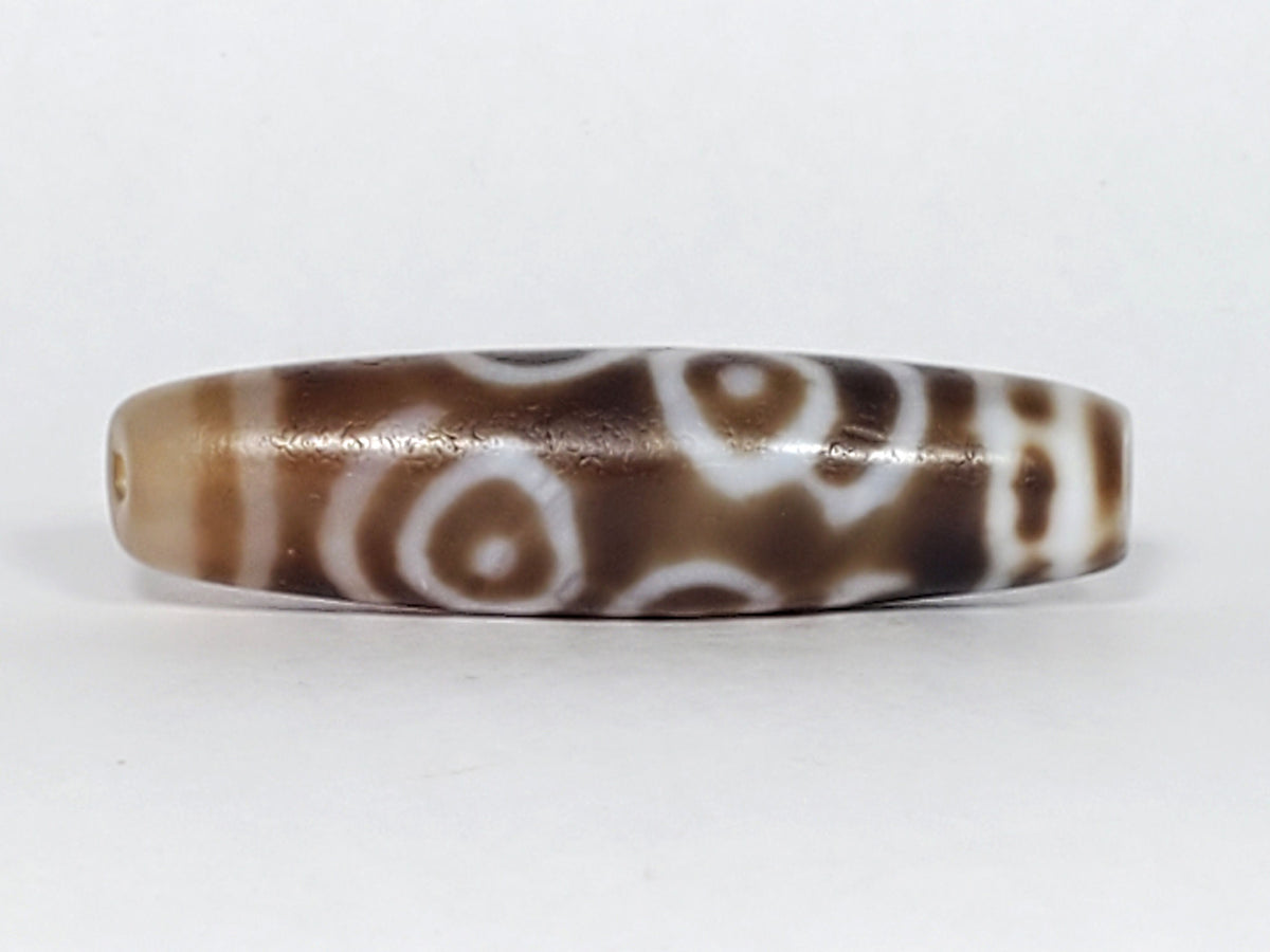 At-061926-PDEBS Face B close angle, semi-translucent glow visible, honey-tan end cap, unretouched