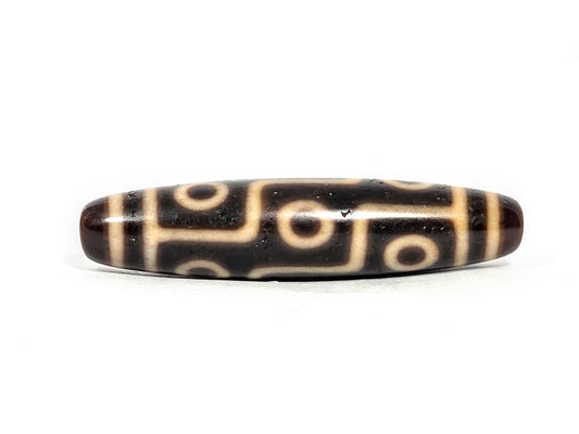 At-070626-9E antique nine eye dzi face B, deep dark brown ground, bold cream stepped eye network rotated, unretouched