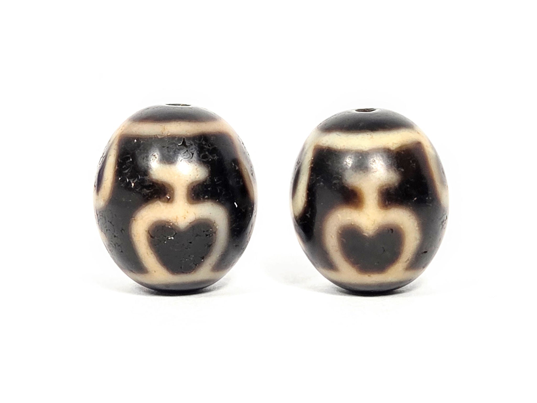 The Power of Symmetry: Why Collectors Seek Matching Dzi Pairs and