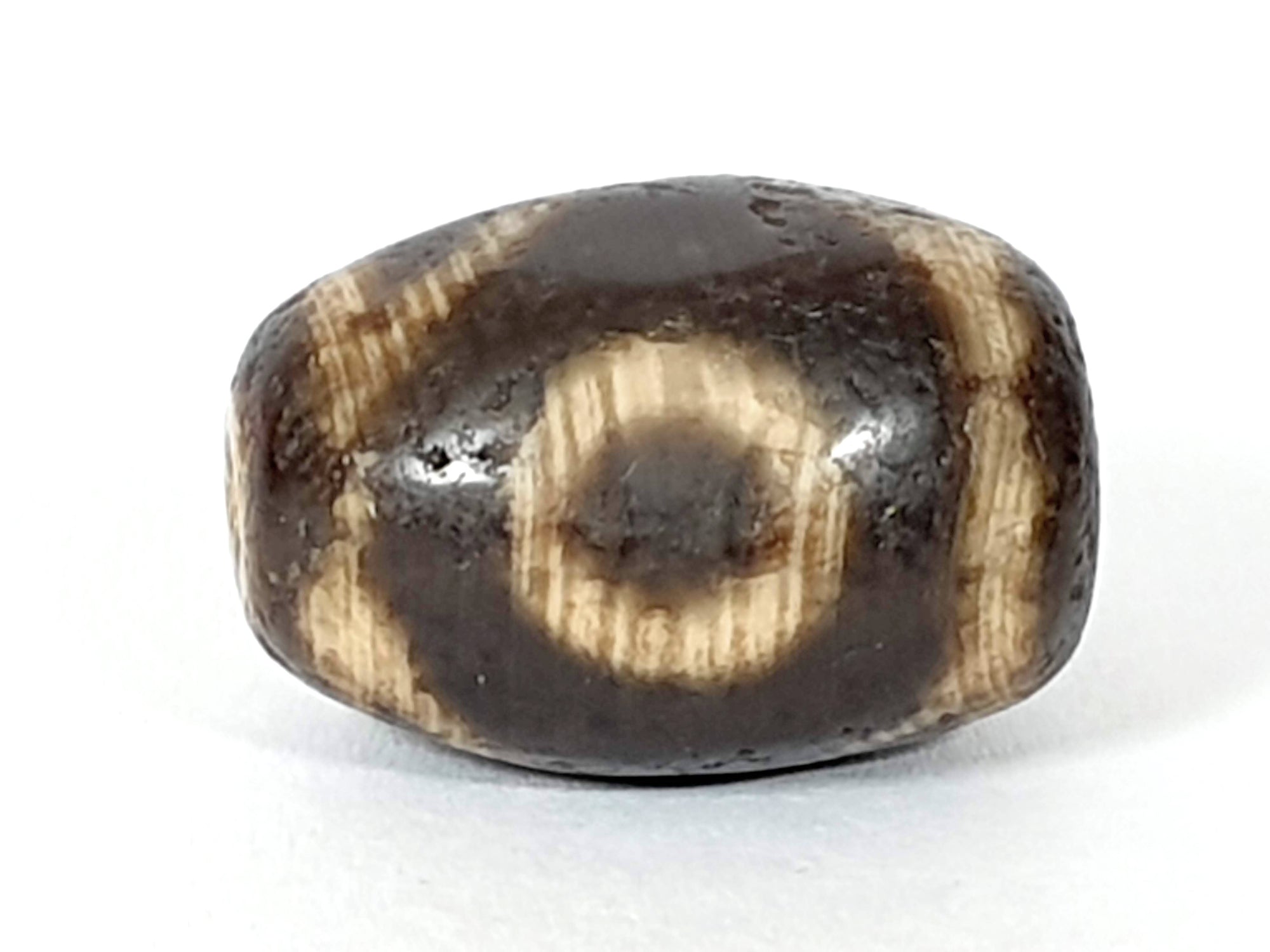 Ancient Two Eye & Tiger Tooth Motif Pumtek Bead
