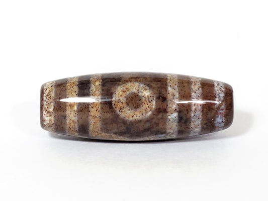 three eye dzi bead with extreme bloodspot inclusions